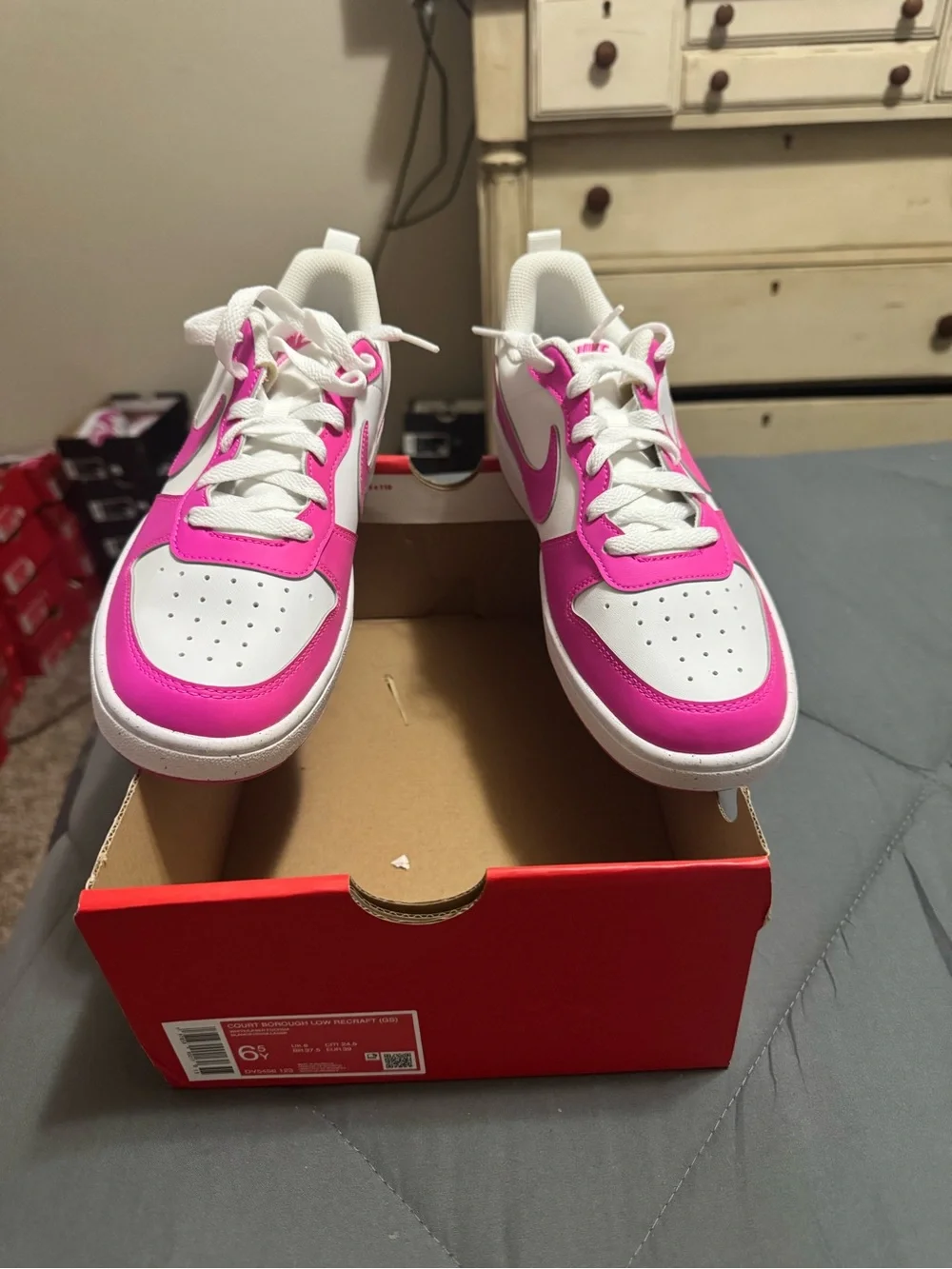 Nike Kids Low-Top Sneakers in White and Hot Pink